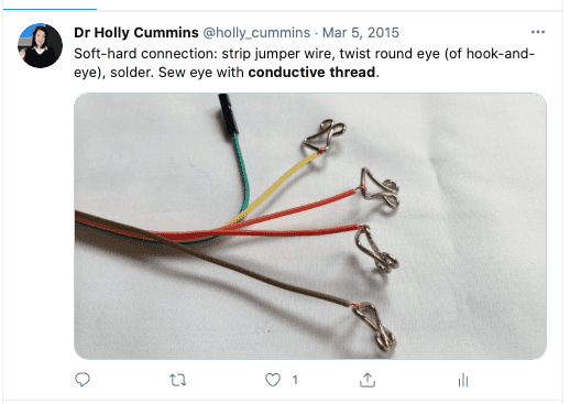 Tweet: Soft-hard connection: strip jumper wire, twist round eye (of hook-and-eye), solder. Sew eye with conductive thread.